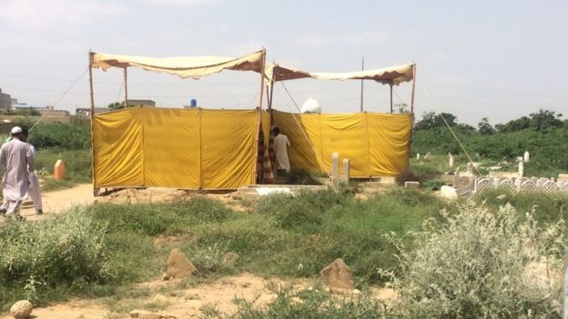 One of the graves being exhumed at a graveyard in Pakistan