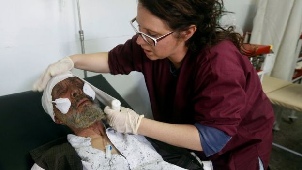 An injured man receives treatment at a hospital after a blast in Kabul