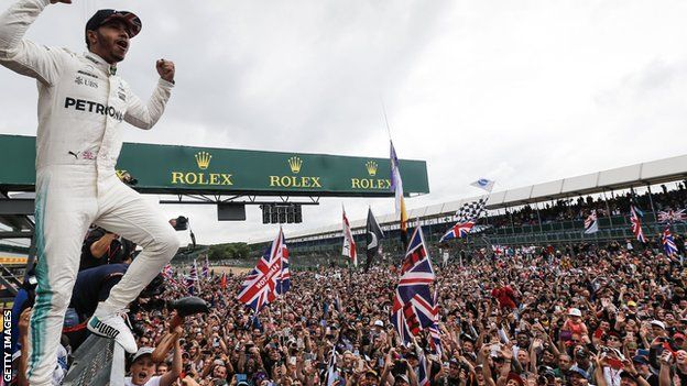 Lewis Hamilton celebrates Silverstone win