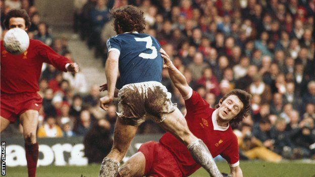Mike Pejic lets Liverpool's Jimmy Case know he's there in the 1977 FA Cup semi-final