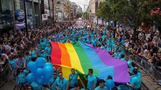 Members of the Lesbian, Gay, Bisexual and Transgender (LGBT) community take part in the Pride Parade in London