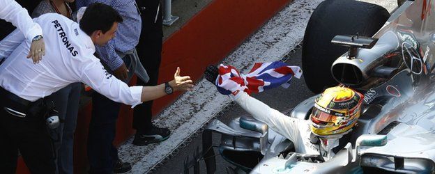 Toto Wolff and Lewis Hamilton celebrate