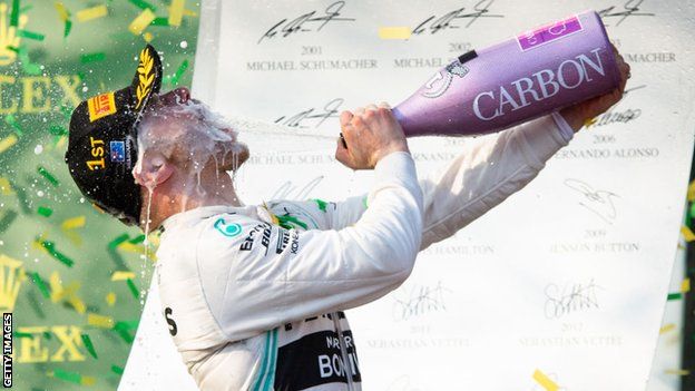 Valtteri Bottas sprays champagne