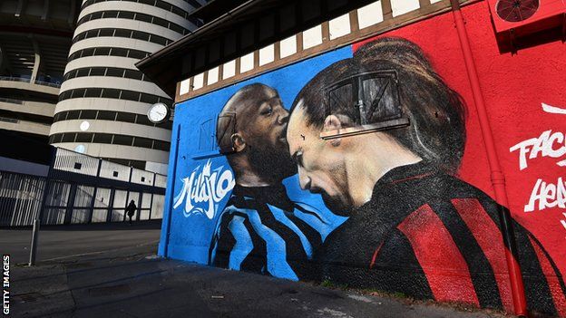 A mural of the clash between Romelu Lukaku and Zlatan Ibrahimovic next to the San Siro