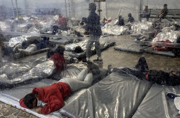 Child migrants: First photos emerge of Biden-era detention centres ...