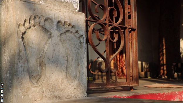 A cast of Swapna Burman's footprint outside her family home