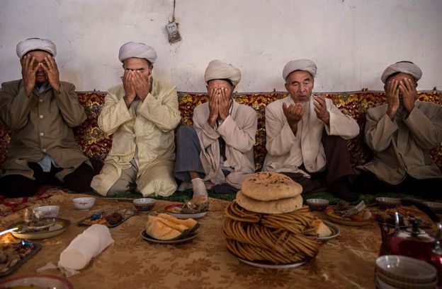 Uigures en Xinjiang.