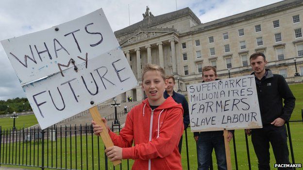 Young farmers holding placards at the protest