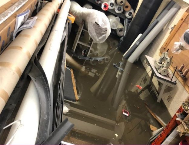 Inside flooded carpet shop
