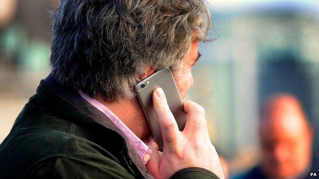 man using a mobile phone