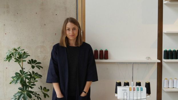 Aimee Harrison standing in her studio