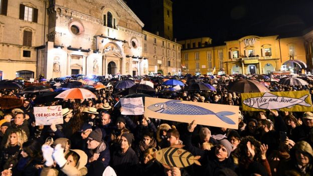 Protesters attend a demonstration held by the "Sardines", a grassroots movement against far-right League leader Matteo Salvini, in Reggio Emilia, Italy, 23 November 2019