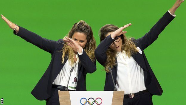 Italian snowboarder Michela Moioli and skier Sofia Goggia dab after giving a presentation to the IOC