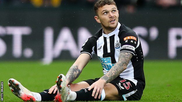 Kieran Trippier reacts after being injured against Aston Villa