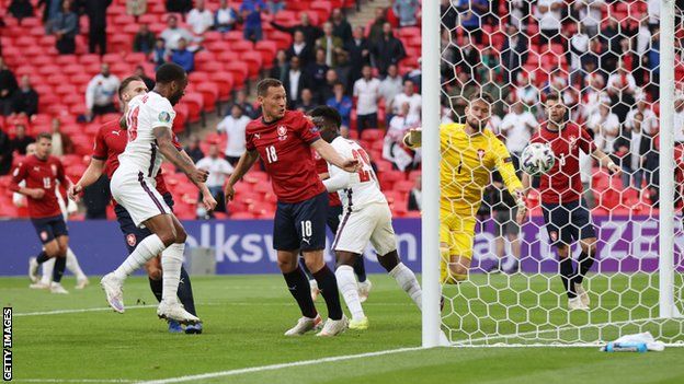 Raheem Sterling scores the opener for England