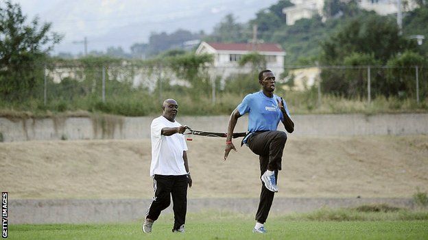 Glen Mills e Usain Bolt