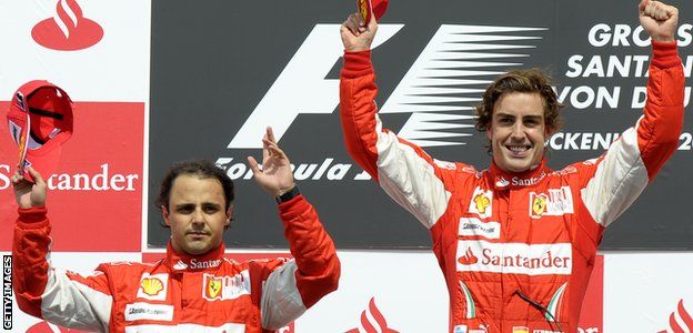 Felipe Massa and Fernando Alonso on the podium during the German Grand Prix 2010
