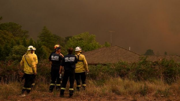 New South Wales firefighters watch as the Grose Valley Fire approaches Kurrajong Heights