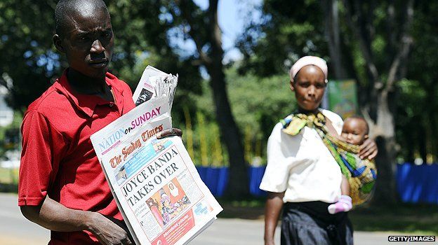 Newspaper vendor in Malawi
