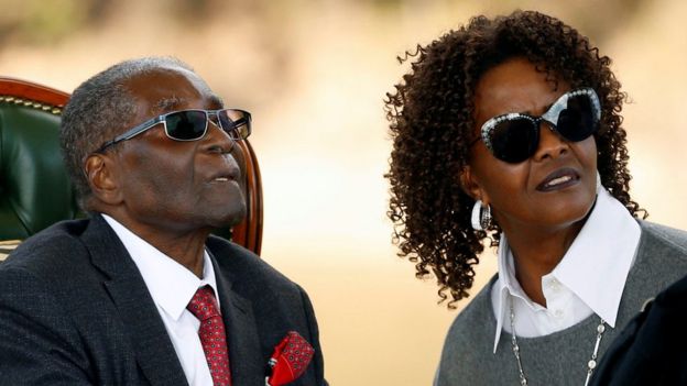 Zimbabwe's former president Robert Mugabe and his wife Grace look on after addressing a news conference at his private residence nicknamed "Blue Roof" in Harare, 29 July 2018