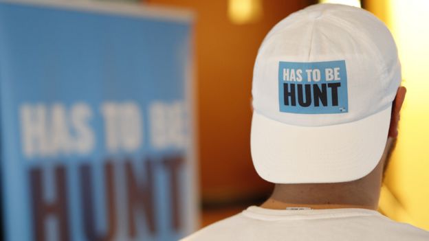 Hunt supporter wears a themed baseball cap