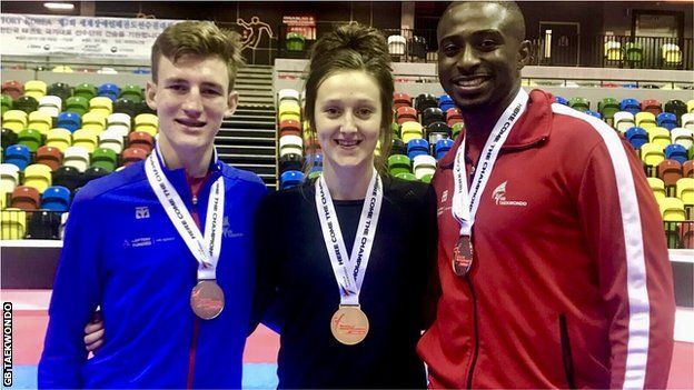 Lauren Williams, Bradly Sinden and Mahama Cho pose with their medals at the World Taekwondo Grand Prix