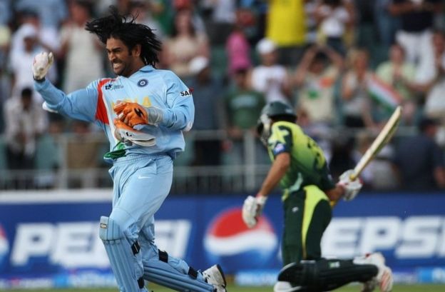 MS Dhoni of India celebrates his team"s victory with Misbah-ul-Haq of Pakistan looking on the Twenty20 Championship Final match between Pakistan and India at The Wanderers Stadium on September 24, 2007