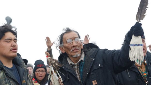 Nathan Phillips prays with other protesters near the main opposition camp against the Dakota Access oil pipeline near Cannon Ball, North Dakota, U.S., February 22, 2017