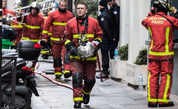 firefighters in action after a fire broke out at an apartment in the 16th district of western Paris, France, 05 February 2019.