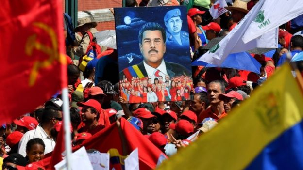Supporters of Venezuelan President Nicolas Maduro gather to mark the 20th anniversary of the rise of power of the late Hugo Chavez, the leftist firebrand who installed a socialist government, in Caracas on February 2, 2019