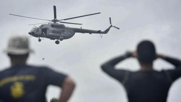 Navy helicopters drop food for people stranded at Pandanad in Chengannur. 19 Aug 2018