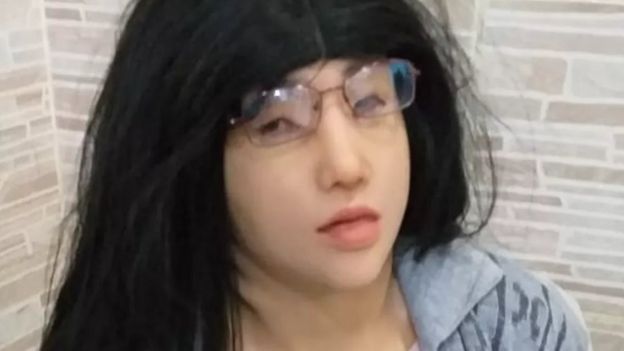 Photo released by the Rio de Janeiro state prison authorities of Clauvino da Silva disguised as his daughter