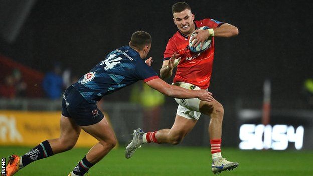 Munster's Shane Daly tries to get past Ulster wing Ben Moxham