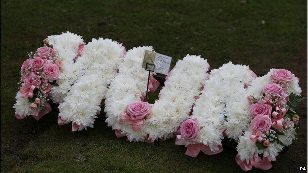 A floral tribute left at the grave of Lamara Bell after her funeral at Falkirk Crematorium