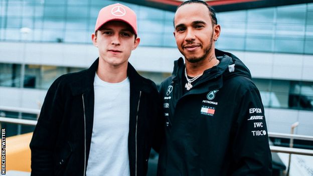 Tom Holland poses with Lewis Hamilton