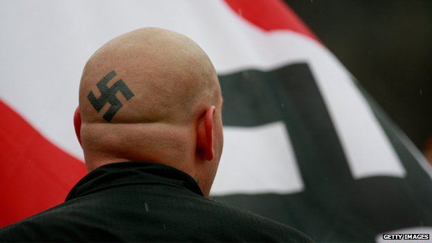 Swastika tatoo on head 19 April 2009