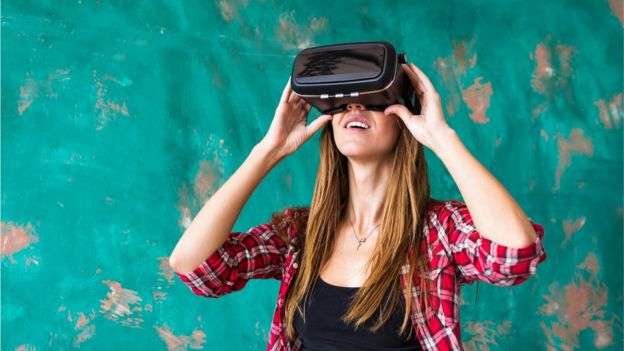 A woman with a virtual reality mask