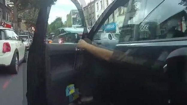Person opening car door