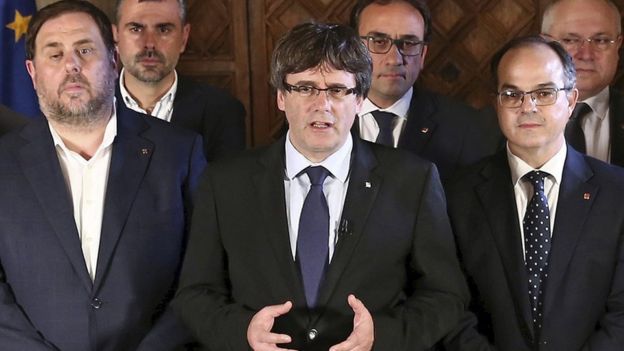 Catalan leader Carles Puigdemont (C) and his cabinet giving a press statement on the independence referendum in Barcelona, Spain, 1 October 2017