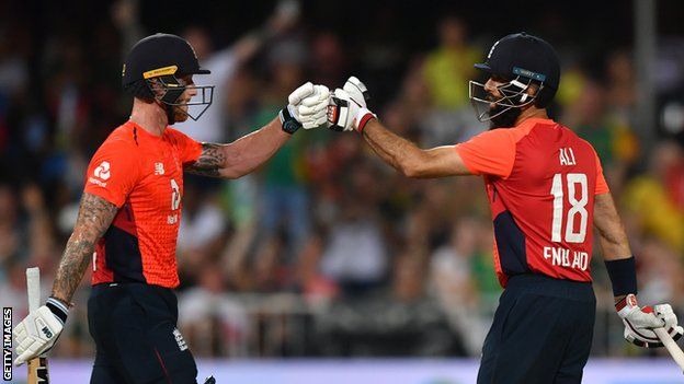 England batsmen Ben Stokes (left) and Moeen Ali (right) punch gloves during the second T20 against South Africa
