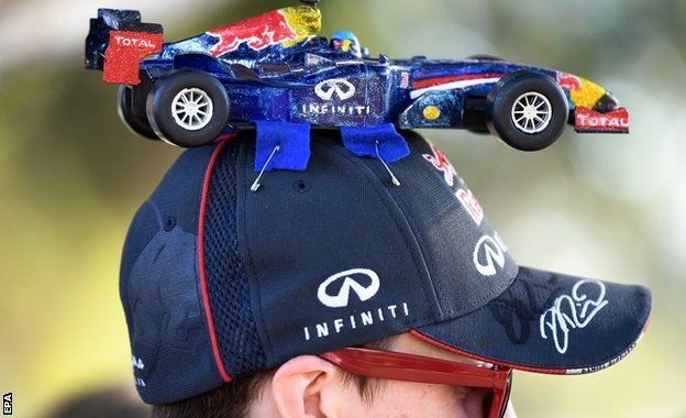 F1 fan is seen with a Red Bull hat