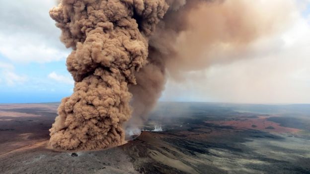 In this handout photo provided by the U.S. Geological Survey, a column of robust, reddish-brown ash plume occurred after a magnitude 6.9 South Flank following the eruption of Hawaii"s Kilauea volcano on May 4, 2018