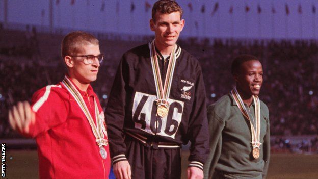 Canada's Bill Crothers, New Zealand's Peter Snell and Kenya's Wilson Kiprugut, medal winners in the 800m, on the podium at the 1964 Tokyo Olympics