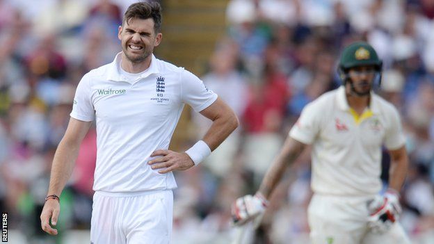 James Anderson holds his side