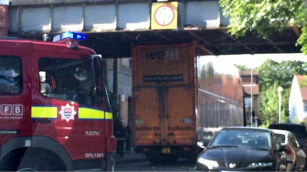 The lorry trapped under the bridge