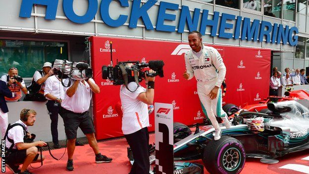 Lewis Hamilton celebrates victory at the 2018 German Grand Prix at Hockenheim