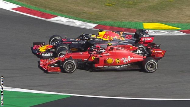 Charles Leclerc and Max Verstappen race side by side