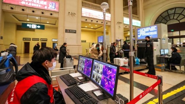 Thermal scanners that detect temperatures of passengers inside the Hankou station in Tuesday
