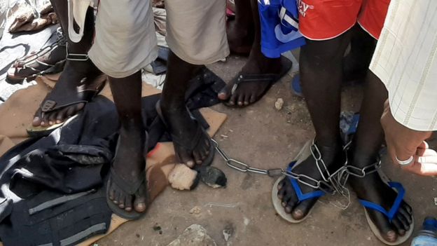 People with chained legs are pictured after being rescued by police in Sabon Garin, in Daura local government area of Katsina state, Nigeria October 14