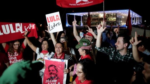 Supporters of Brazil's former president Luiz Inacio Lula da Silva protest outside the Supreme Federal Court